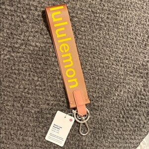 Lululemon Orange Keychain with Yellow Logo